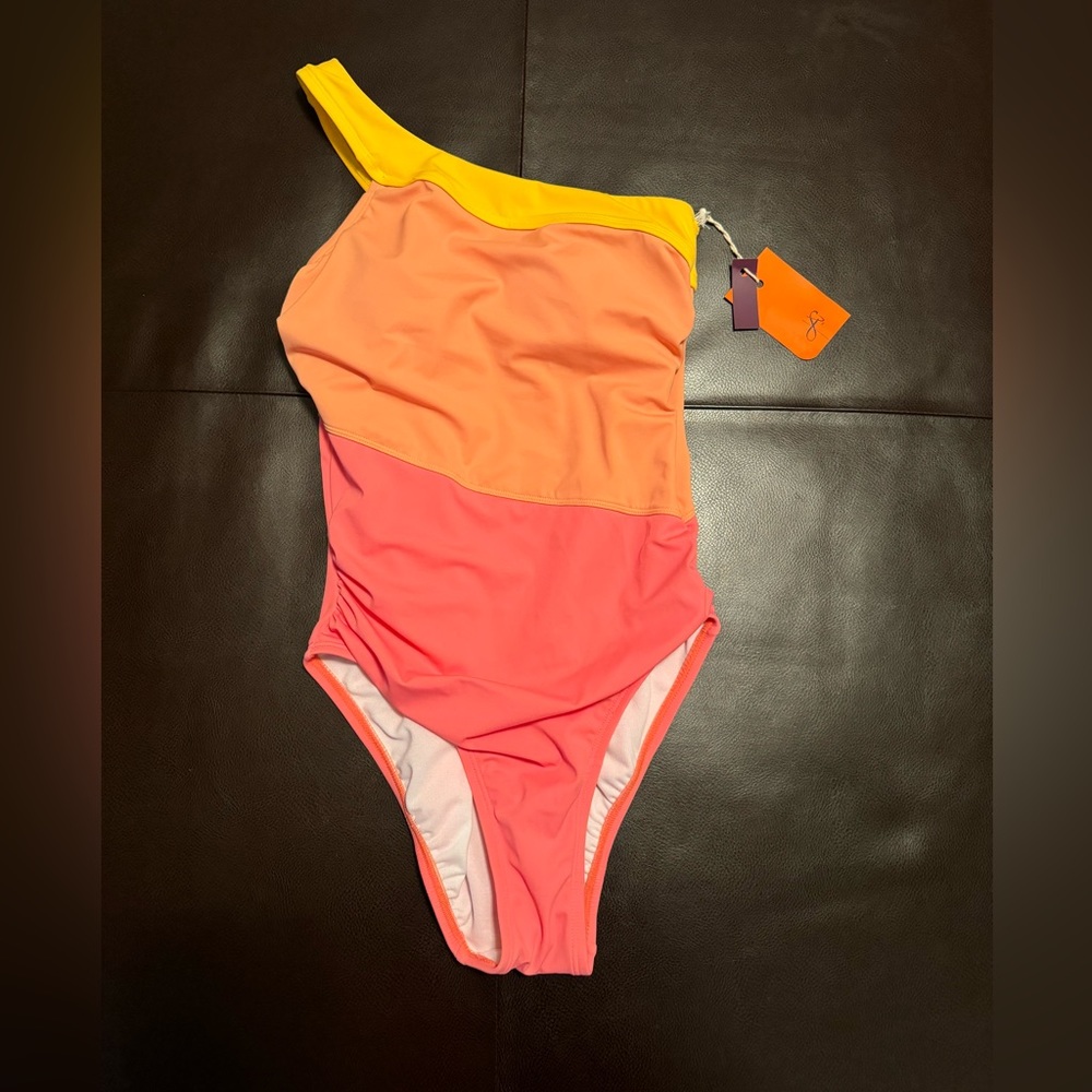 NWT Freely asymmetrical colorblock one price swimsuit size S